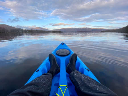 Blue kayak on open water at Loch Lomondの写真素材