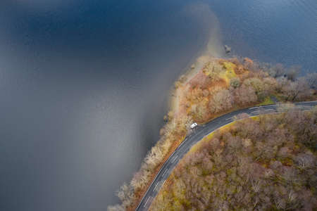 Loch Lomond aerial view showing the A82 road during autumn