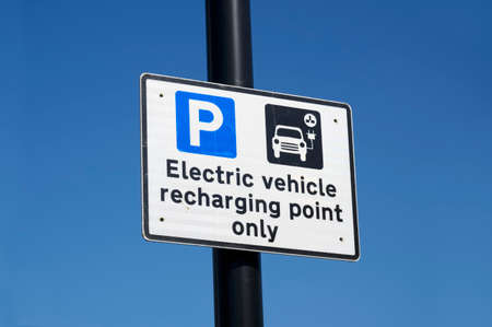 Electric recharging point for vehicle car or bike free no charge in car parking spaceの写真素材