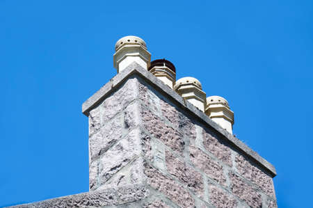 Chimney pots on old victorian house roofの写真素材