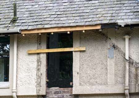 Roof slates in a row ready for new roof construction