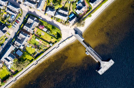 Luss village aerial view during summer over Loch Lomond