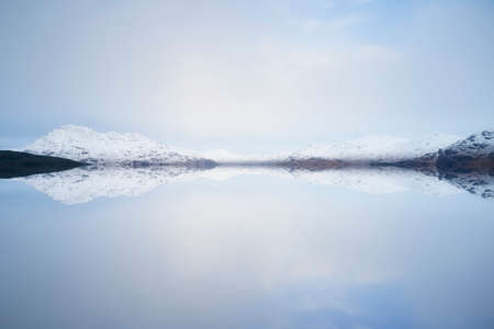 Peaceful calm lake during winter at Glencoeの写真素材