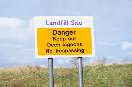 Landfill site danger deep lagoons safety signの写真素材