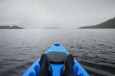 Blue kayak on open water at Firth of Clydeの写真素材
