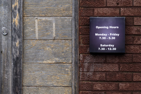 Business shop opening and closed times in hours and daysの写真素材