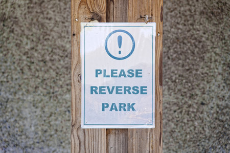 Reverse park please sign at public car parkの写真素材