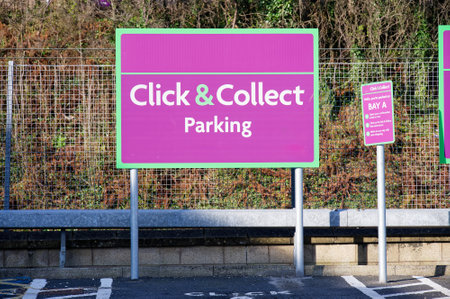 Click collect online internet shopping sign at shop car park laneの写真素材