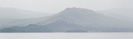 Storm and dark clouds over on open water at Loch Lomondの写真素材