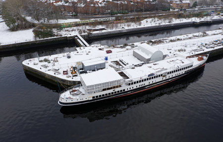 Glasgow, UK, December 3rd 2023, Queen Mary Ship moored on the River Clyde during refurbishment works in the winterのeditorial素材