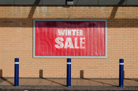 Winter sale sign on shop wall in retail developmentの写真素材