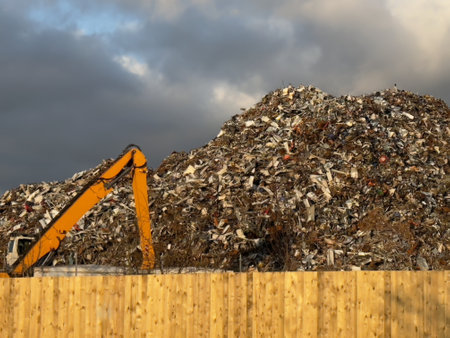 Metal recycling compound showing large heap of rubbishの写真素材