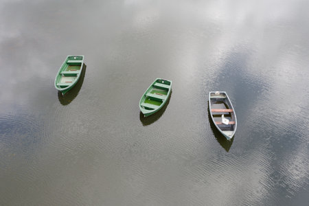 Fishing boats on Knapps Loch in Kilmacolmの写真素材