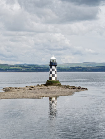 Lighthouse with black and white chequer designの写真素材