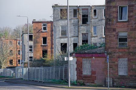 Tenement flats in poor housing area in Glasgowの写真素材