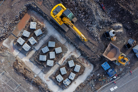 Construction building site aerial view showing materials