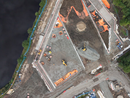 Construction building site aerial view showing materials