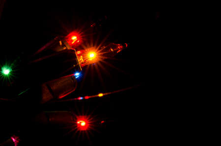 Christmas Lights Shining in the Darknessの写真素材