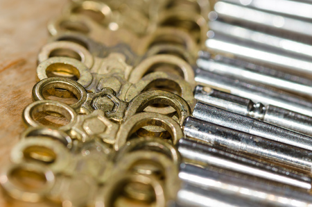 Row of Antique Pocket Watch Keys Laying on the Watchmakers Benchの写真素材