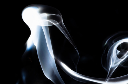 Nature Abstract: The Delicate Beauty and Elegance of a Wisp of Smokeの写真素材