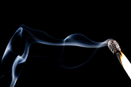 Smoke Swirling from Burnt Wooden Matchstick