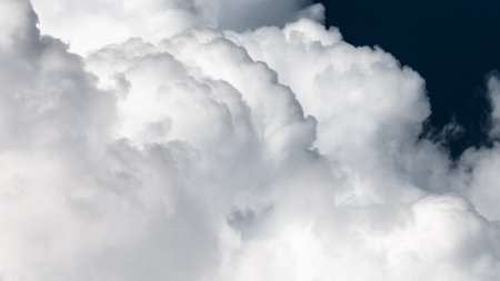 Mountainous Cumulus Clouds Boiling in the Summer Skyの写真素材