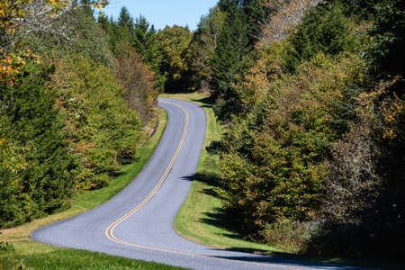 Roadway Meandering Through the Autumn Appalachian Mountains Along the Blue Ridge Parkwayの写真素材