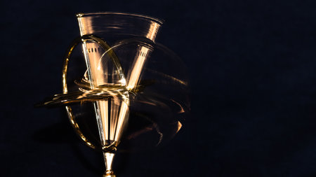 Abstract Metallic Image Caused by the Spinning of a Golden Gyroscopeの写真素材