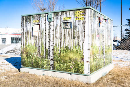 Airdrie Alberta Canada, March 24 2022: Utility box public art locally painted to add vibrancy to a...