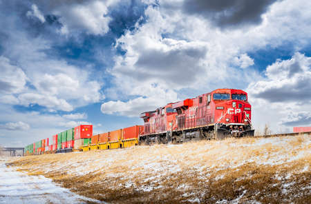Calgary Alberta Canada, April 30 2022: A Canadian Pacific Locomotive  carries important global...