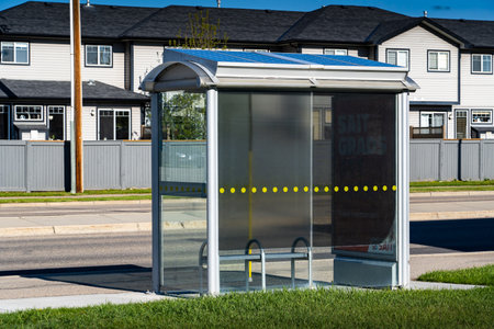 Airdrie Alberta Canada, July 9 2022: A Solar Bus Shelter producing clean energy for public transit in a sustainable community.のeditorial素材