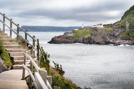 St. John's Newfoundland Canada, September 13 2022: Battery Road hiking trail along Signal Hill overlook St. John'n Harbour and the Fort Amherst Lighthouseのeditorial素材