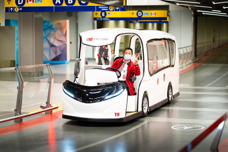 Calgary Alberta Canada, September 08 2022: A YYC Link electric bus for transporting travellers to different terminals at the Calgary International Airport.のeditorial素材