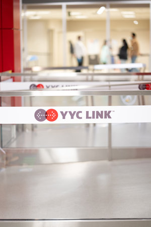 Calgary Alberta Canada, September 08 2022: YYC Link shuttle station sign at the indoor bus stop for transporting travellers.のeditorial素材