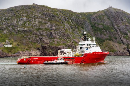 St. John's Newfoundland Canada, September 20 2022: A pilot boat guides an offshore oil rig supply...