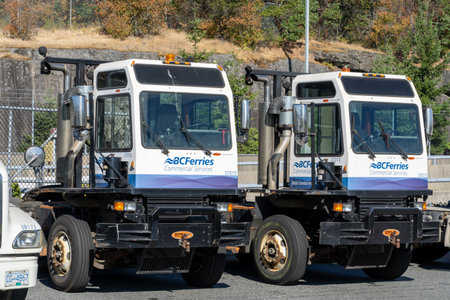Nanaimo British Columbia Canada, July 23 2023: Pair of Yard Jockey's owned by BC Ferries Corporation parked awaiting tractor trailers at a loading dock.のeditorial素材