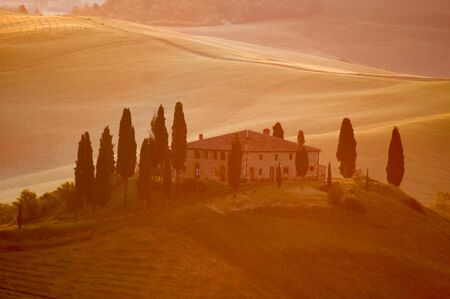 Early-morning light on an Italian villa in the Tuscany region of Italy.の写真素材