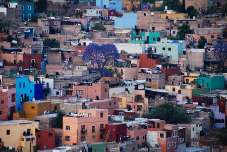 View looking down at the colorful houses of the Spanish colonial highland town of Guanajuato, Mexico.の写真素材