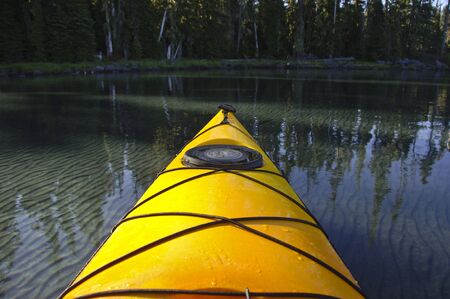 Prow of a yellow kayak.の写真素材
