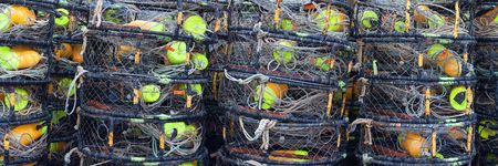 Stack of crab traps in panoramic format.の写真素材
