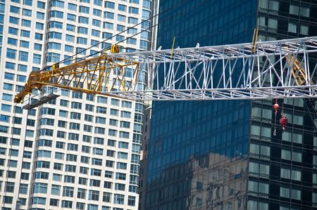 Construction cranes at work putting up high rise buildings at the new World Trade Center.の写真素材