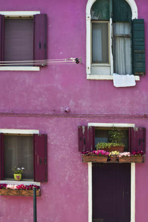 Colorful house with white framed windows in Burano Italyのeditorial素材