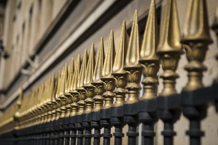 Iron fence with gold points in Paris, Franceの写真素材