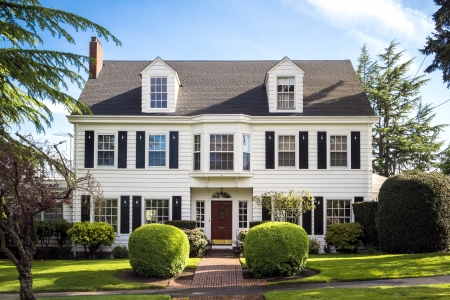 Classic American suburban house with blue sky backgroundのeditorial素材