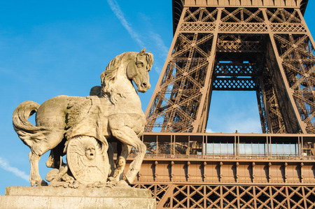 Statue of a horse on the Lena Bridge and Eiffel Tower in Paris, Franceの写真素材