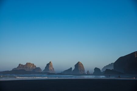 Rocky coast in Oregon in the early morning lightの写真素材