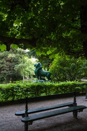 Luxembourg garden, Paris, France with bench and lion statueの写真素材