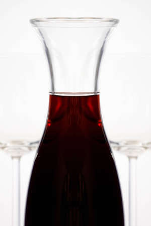 flasch in red and with the glass and backgroundの写真素材