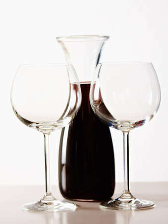 flasch in red and with the glass and background