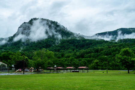 A rainy day in Chimney Rock makes the clouds hang low over the mountain tops.の写真素材